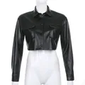 Detailed front view of black cropped faux leather jacket with chest pockets and collar - S / Tops / Black