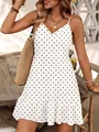 Detailed view of a white polka dot V-neck camisole dress with elegant ruffled hemline - S / Top And Bottom / White Polka Dot