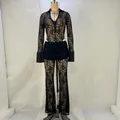 Detailed view of women's sexy black lace long sleeve top and flared pants set - S / Top And Bottom / Black