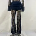 Elegantes schwarzes Spitzen-Set mit ausgestellter Hose und langärmeligem Oberteil. - S / Unterteile