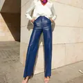 Full view of blue PU leather straight-leg high-waisted trousers styled with white shirt - S / Bottoms / Blue