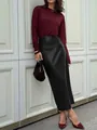 Elegant black high-waisted faux leather midi skirt styled with burgundy top and heels - S / Black
