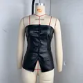 Detail view of a black PU leather tube top with single-breasted buttons on a mannequin. - S / Tops / Black