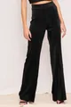 Detailed view of high-waisted black velvet wide-leg pants on a model fit profile - S / Bottoms / Black