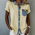 Gedetailleerde weergave van vintage damestop met gele stof en blauwe denim zak-patchwork - S / Tops / Geel