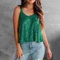 Detailed macro view of vibrant green shimmering sequins on a stylish women's party camisole top - Green