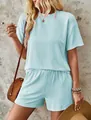 Detailed look at light blue wavy textured two-piece set with short sleeves and shorts - Light Blue