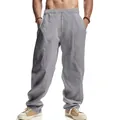 Pantalones casuales de lino gris para hombre con pernera ancha y cordón mostrados en modelo - Gris claro