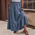 Detail view of a blue tiered maxi skirt with elastic waist for plus size women - XL / Bottoms / Dark Blue