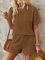 Close-up detail of women's summer 2-piece set featuring wavy texture fabric and casual style - Tan