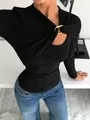 Close-up detail of a black asymmetrical draped long sleeve top featuring a gold metal ring - S / Tops / Black