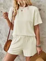 Close-up of cream short sleeve set with wave texture and elastic shorts - Apricot