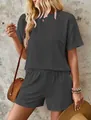 Detailed view of the dark grey waffle knit texture on this summer two-piece outfit. - S / Top And Bottom / Black