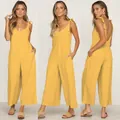 Detail showing front side and back views of a yellow bow shoulder jumpsuit - S / Top And Bottom / Yellow