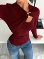 Close-up of asymmetrical draped knit top with golden metal buckle and cutout detail - S / Tops / Burgundy