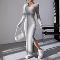Grijze geribbelde gebreide maxi-jurk met lange mouwen, polokraag en zijsplit detail - S / Tops / Grijs