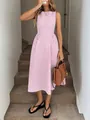 Vestido midi sin mangas con rayas verticales rosa y blanco con bolsillos en una modelo - S / Vestidos / Rosa rojo