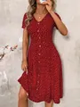 Abito rosso a pois con scollo a V e bottoni decorativi sul davanti vista dettagliata - Taglia S / Borgogna