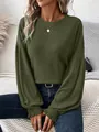 Close-up of olive green ribbed long sleeve t-shirt with ruffled lantern cuffs - S / Tops / Army Green