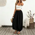 Full view of women's black high-waisted lantern pants for beach vacation style - S / Bottoms / Black