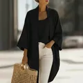Detailansicht eines eleganten schwarzen Leinen-Cardigans mit passendem Tank-Top für Damen - S / Oberteile / Schwarz