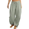 Dettaglio dei pantaloni jogger larghi da donna con vita elasticizzata e tasche verde salvia - verde-grigio