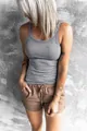 Women's slim-fit grey ribbed tank top shown on model with casual shorts - S / Tops / Gray