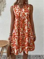 Detailed view of bohemian loose V-neck sleeveless dress with terracotta floral print - S / Top And Bottom / Orange