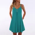 Close-up of teal V-neck swing dress with decorative wooden buttons - S / Top And Bottom / Lake Blue