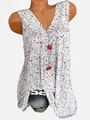 Detalle de blusa sin mangas con cuello en V y estampado de flores rosas en blanco - S / Tops / Blanco