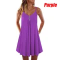 Detail view of a purple summer sleeveless dress with green button accents and V-neck - Purple