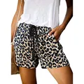 Close-up of leopard print high waist shorts featuring black drawstring and pockets - M / Bottoms / Leopard Print