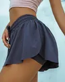 Close-up of navy blue 2-in-1 sports shorts showing the elastic waist and layered design - S / Bottoms / Blue