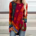Close-up of retro irregular hem T-shirt with vibrant polka dot and stripe prints. - S / Tops / Red