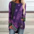 Detailed view of women's vintage purple T-shirt with irregular hem and ethnic print - S / Tops / Purple