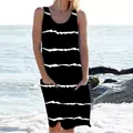 Close-up view of casual black and white striped summer dress with side pockets at the beach - S / Top And Bottom / Black