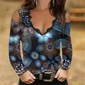 Close-up of a women's V-neck cold shoulder long sleeve top with blue floral print - Gray