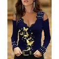Detail view of cold shoulder lace V-neck top with gold butterfly print and stud accents. - 4XL / Tops / Gold Butterfly - Navy Blue