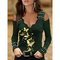 Detailed view of cold shoulder long sleeve top with lace V-neck and butterfly print - 4XL / Tops / Gold Butterfly - Dark Green