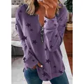 Detailweergave van een paarse damessweatshirt met sterrenprint en ritssluiting aan de voorkant - Paars