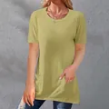 Detail view of a loose-fit olive green crew neck T-shirt for women with functional side pockets - S / Tops / Matcha Green