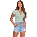 Front view of a model wearing a mint green ribbed Polo top with denim shorts on white background. - S / Tops / Green
