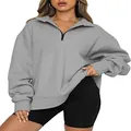 Close-up detail of a grey half-zip fleece-lined sweatshirt for women's casual winter wear. - S / Tops / Gray