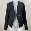 Detail view of women's black blazer with stylish silver side zipper accents - S / Tops / Black