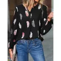 Maglia donna nera a maniche lunghe con scollo a V e stampa di piume - Taglia S / Top / Nero