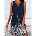 Navy blue sleeveless A-line dress with white floral print and neck cutout detail - S / Top And Bottom / Blue