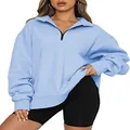 Detailed view of light blue half-zip oversized sweatshirt on model for autumn fashion - Light Blue