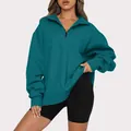 Detailed view of casual teal half-zip long sleeve sweatshirt for women in autumn - Sea Green