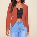 Close-up of rust orange women's blazer featuring stylish zipper pockets and open front design. - S / Tops / Orange