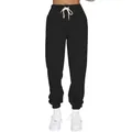Gefütterte Damen-Jogginghose in Schwarz mit elastischem Bund und weißem Tunnelzug-Detail - Schwarz